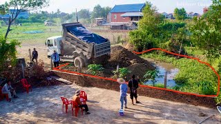 Video of pouring Rocks, mixing soil, clearing fish ponds to grow things By Bulldozer & Dump Truck.