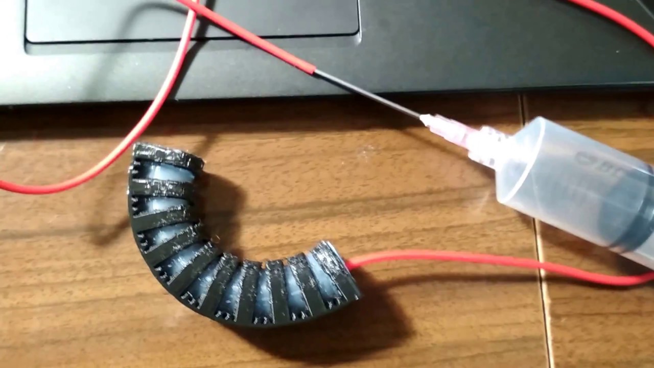 Soft actuator, pre-bent