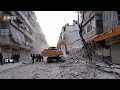 Removing rubble of collapsed building in Aleppo affected by earthquake
