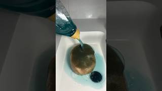 Persil pour onto grout sponge