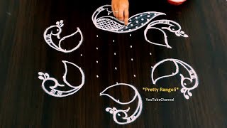 6 tiny beautiful peacocks with 7*4 dots || unique and step by step peacock rangoli