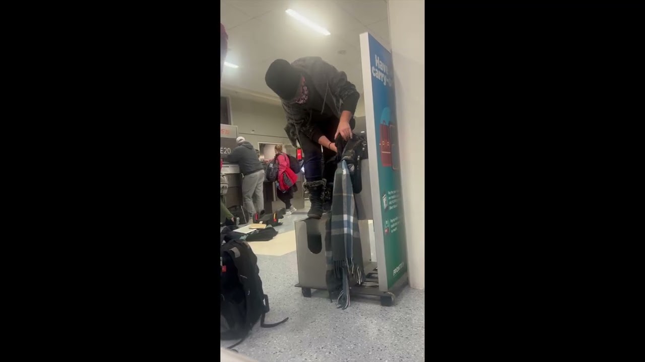 When You're Determined to Get Your Luggage to Fit into the Frontier Free Personal Item Bin