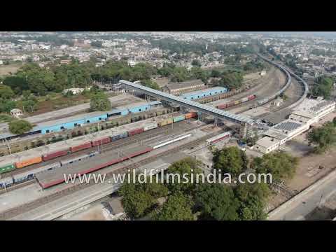 Godhra town in Panchmahal, Gujarat: Aerial view of railway station, trains coming in and departing