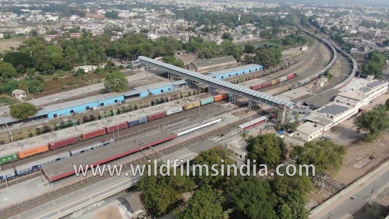 Godhra town in Panchmahal, Gujarat: Aerial view of railway station, trains coming in and departing