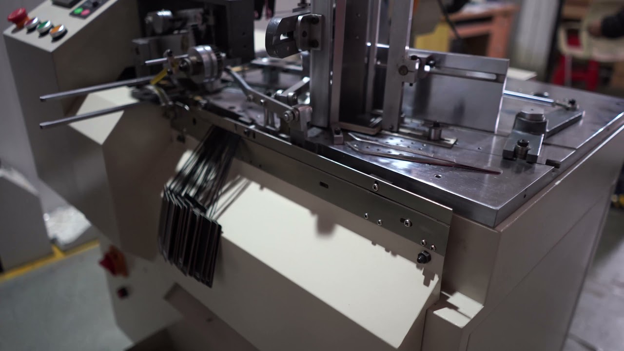 hangtag thread tagging machine - YouTube