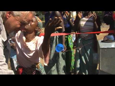 Kurt Dahlin presides at Najila handpump dedication