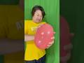 風船を手のひらで割るには【How to pop a balloon with your palm】#shorts