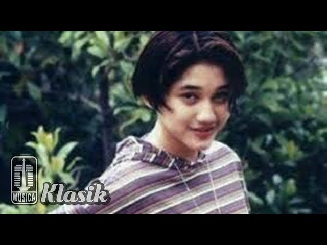 Nike Ardilla - Putuslah Sudah (Official Karaoke Video) class=