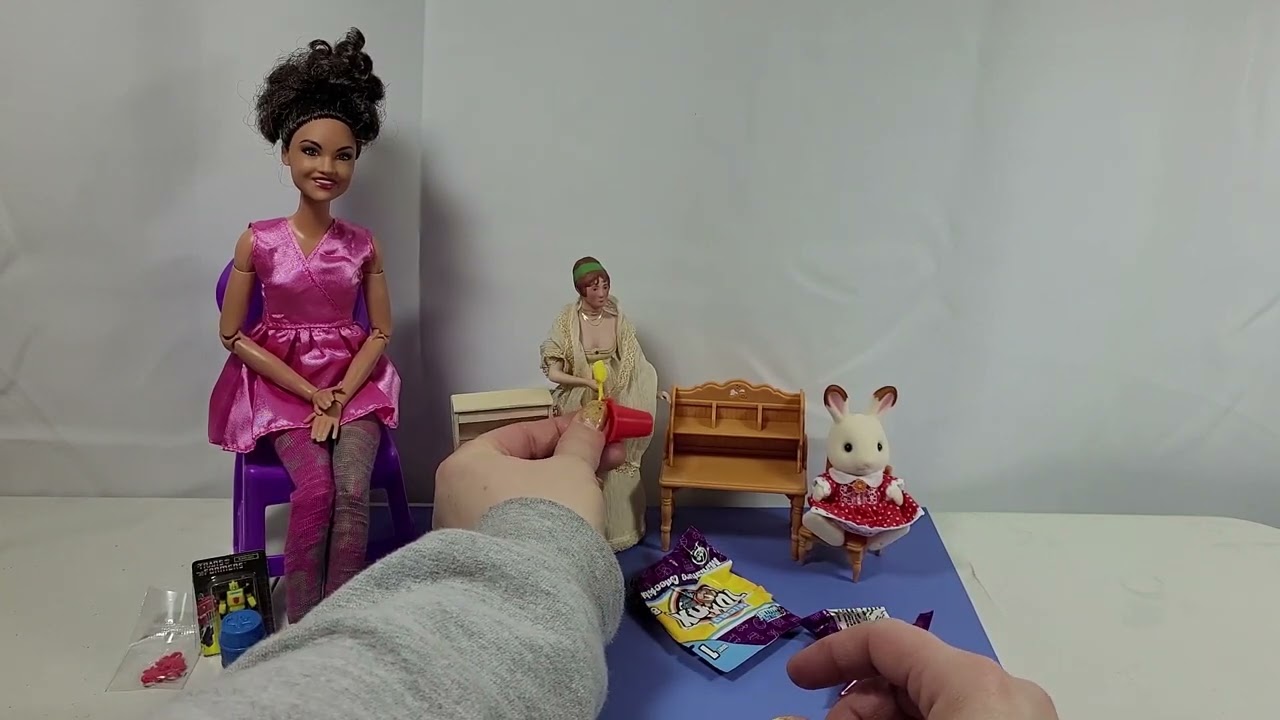 Barrel of Monkeys toy box with four surprises