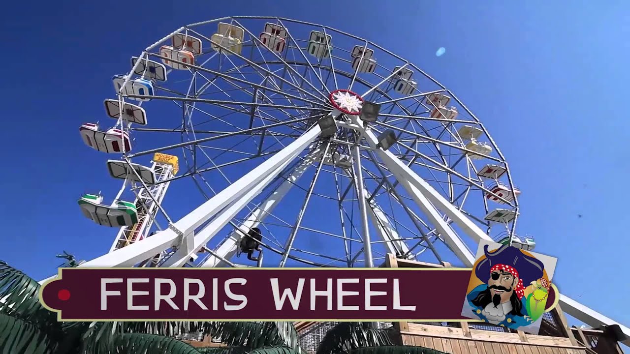 Ferris wheel goes round. | OUTLOOK