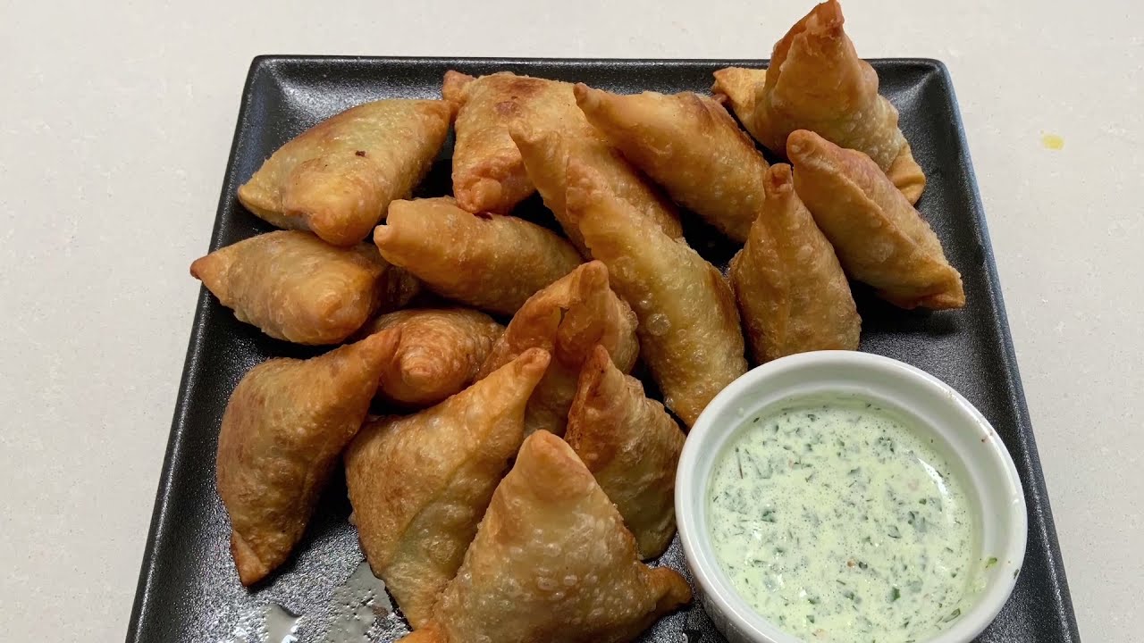 Samosa with vegetables made from uncooked tortillas / سمبوسه  ترکاری از نان خام آماده شده