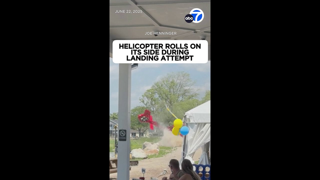 Helicopter rolls on its side during landing attempt