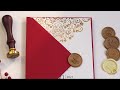 Invitații de nuntă luxury - carton alb, folio auriu și plic roșu