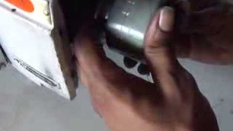 how to service sewing machine overlock-6 cleaning hand wheel - Suresh Lakshman
