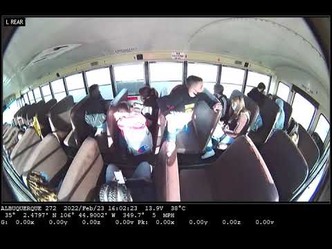 A driver crashes into a school bus in Albuquerque