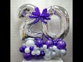 Цифры из воздушных шаров на красивом основании Figures of balloons on a beautiful base