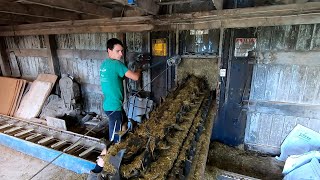 Long-arming Harvestore Silo Unloader