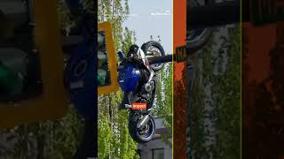 Watch: Motorcycle left dangling from traffic light after horrific crash in Canada.