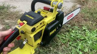 The John Deere 35EV chainsaw and test cutting 12 bar