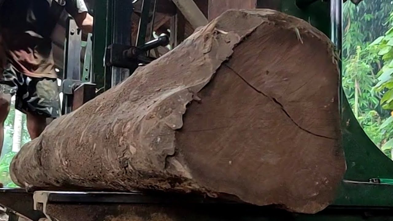 The process of sawing old teak wood into beautiful, high-quality ...