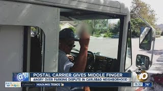 Postal carrier gives middle finger