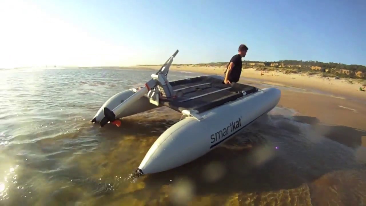 small catamaran with outboard