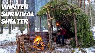 Building a shelter to survive in a cold forest in winter! Making a protection from bad weather