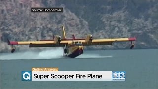 The shiny new plane at lake tahoe airport is drawing lots of
attention. it can repeatedly scoop water from a and drop on fires.