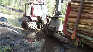 Part 1-MTZ 952.3 with homemade(4WD) trailer in wet forest..