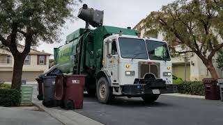 103525 - WM Peterbilt 320 Amrep Revving on Post Xmas Recycle