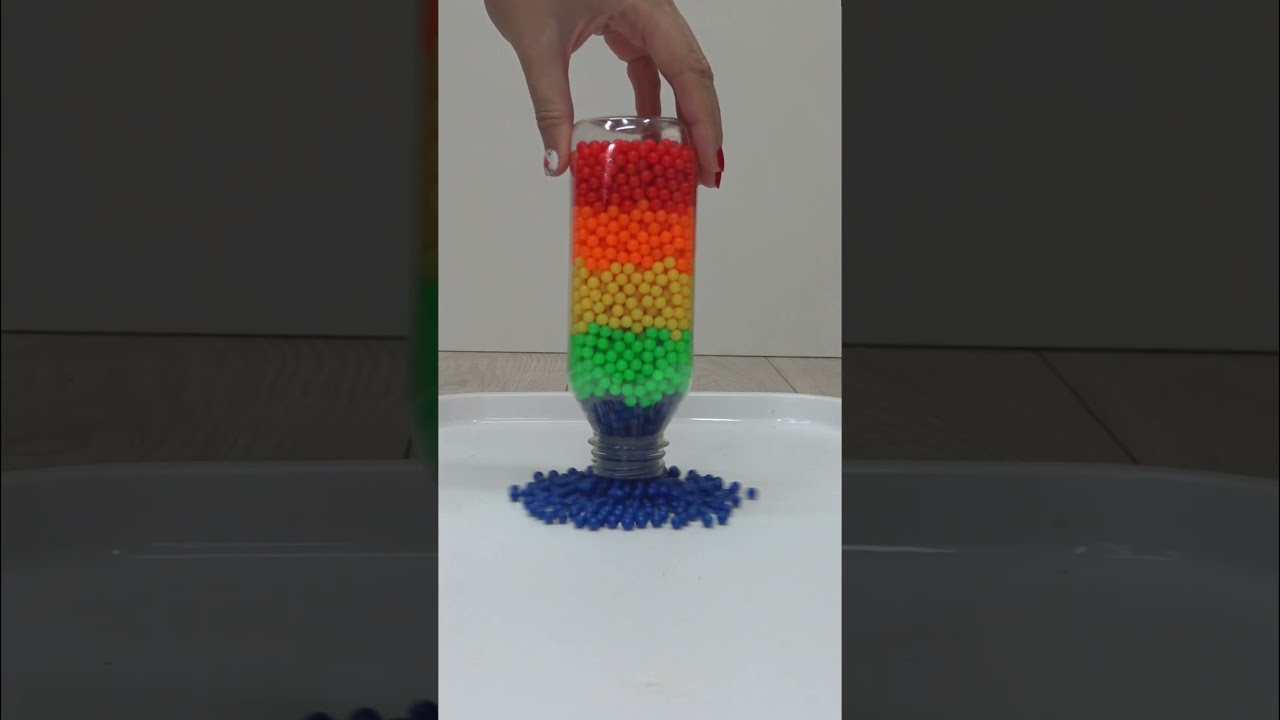 Colorful Plastic Beads in a Bottle Oddly Satisfying Reverse