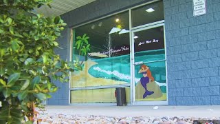 Two men arrested at Bristol business charged with human trafficking
