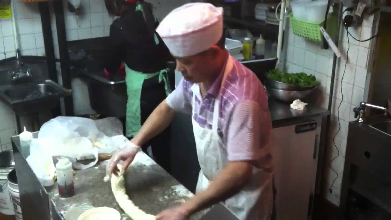 Hand pulling noodles at Tasty Hand Pulled Noodles