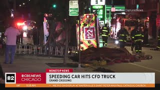 Speeding car hits Chicago firetruck after running red light in Grand Crossing