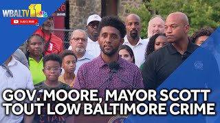 Gov. Moore, Mayor Scott tout low Baltimore crime numbers