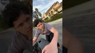 Skateboarder skitches on back of pickup truck and falls on his back