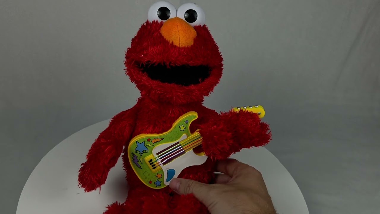 Sesame Street Rock and Rhyme Elmo Talking, Singing 14-Inch Plush Toy