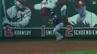 Braun cuts down Ozuna at third