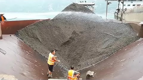 Relaxing Sounds with a Barge Unloading Cobblestones