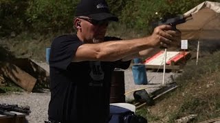 Roy Neal Shoots Bullet Through Knife Handle Profile