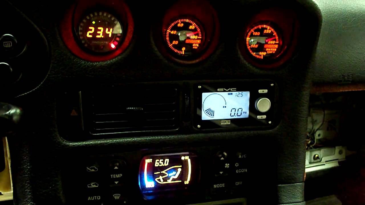 Replaced stock 3000GT/Stealth center gauges with Innovate A/F, oil