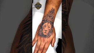 lion with illuminati eye tattoo... I'm on Instagram as @crowninktattooz WhatsApp no. 8287333505