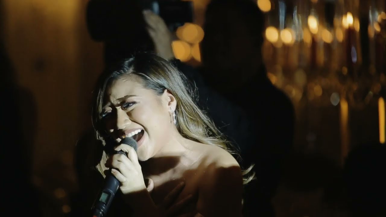 Morissette singing Halo beautifully during our wedding reception at the Manila Hotel
