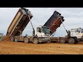 Amazing machinery operation big lake land filling dump truck and bulldozer at work