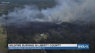 RAW VIDEO: Wildfire burning near homes in Liberty County