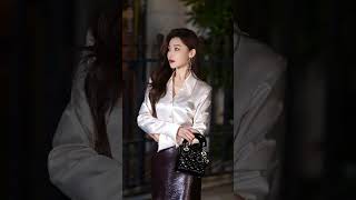 White Satin Blouse Pairing Leather Skirt