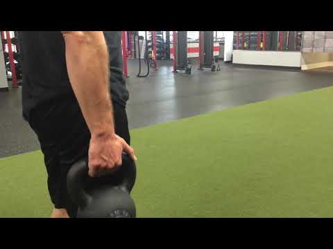 Single Leg Oblique Crunches w. Kettlebell