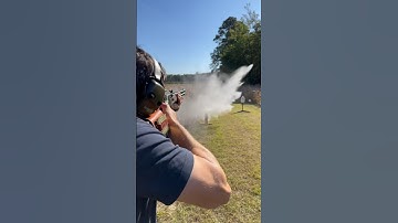 Henry 45-70 Lever Action Rifle With Side Gate Shooting Hot Loads At Water Jugs