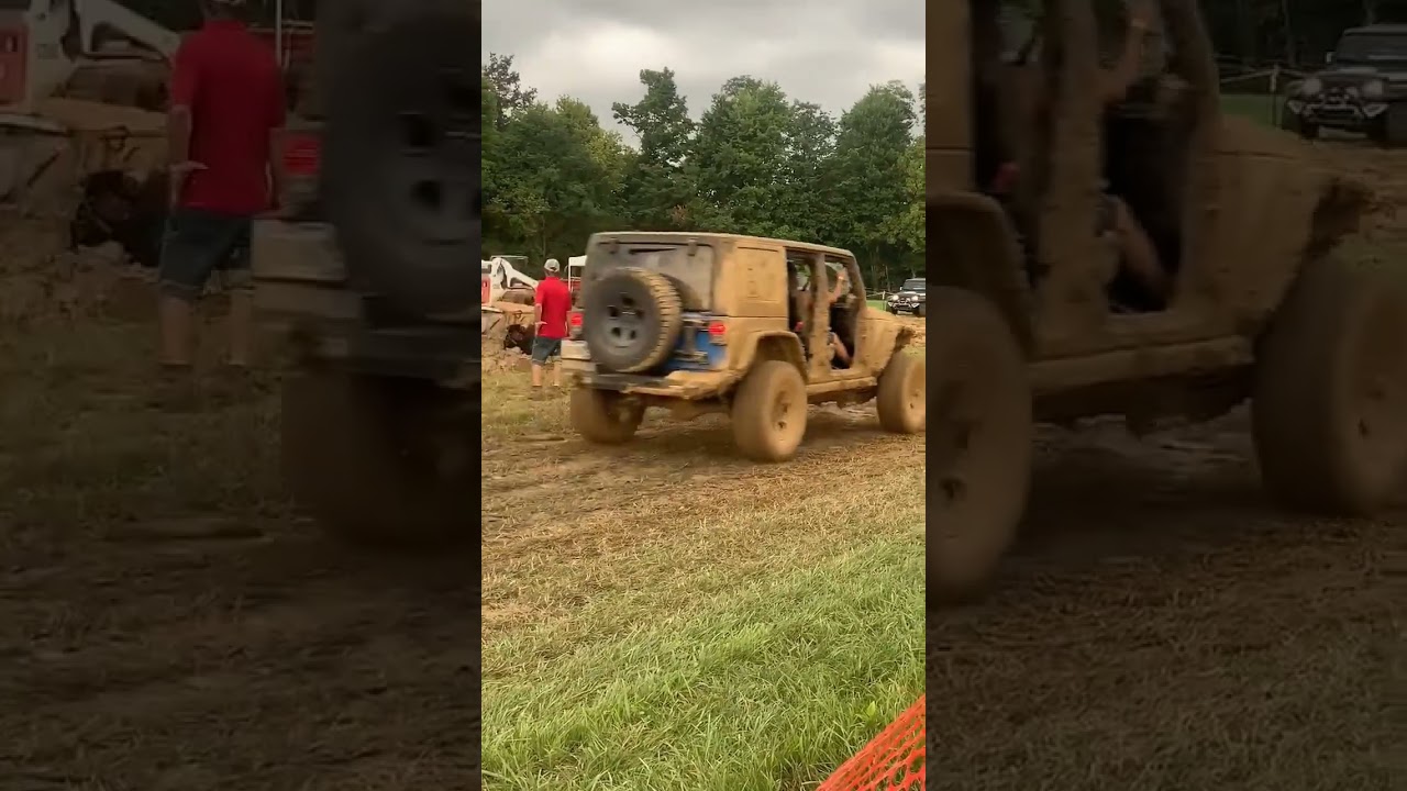 Chris going through one of the mud pits at Jeep Jam. 