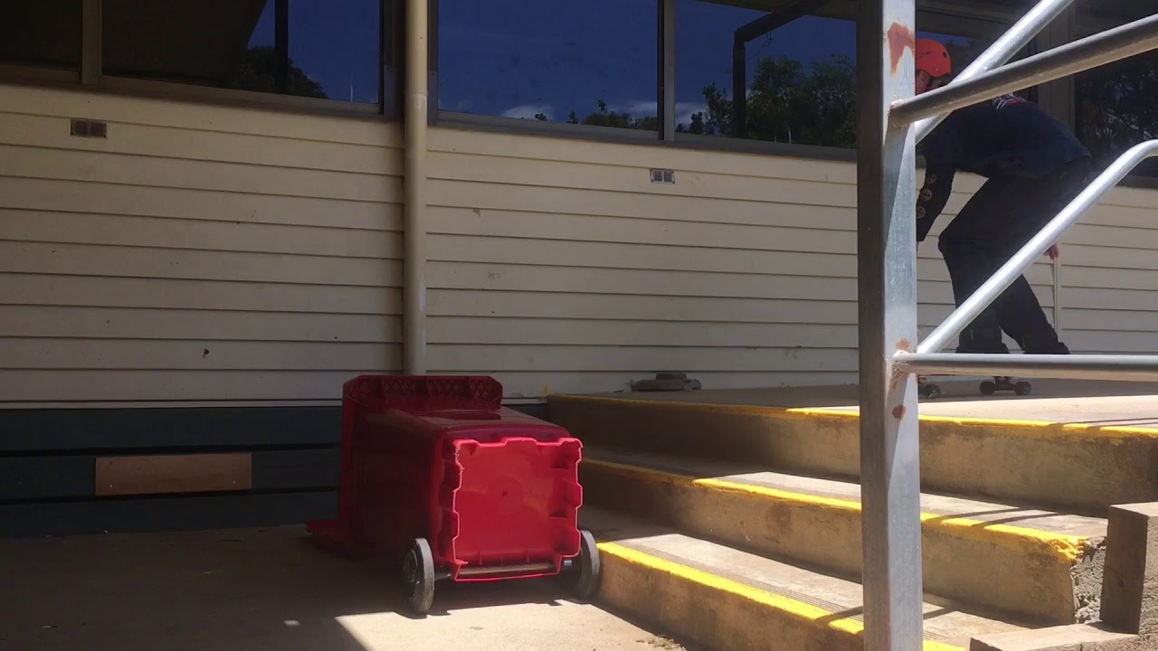 Skateboarding Ollie over bin!!!